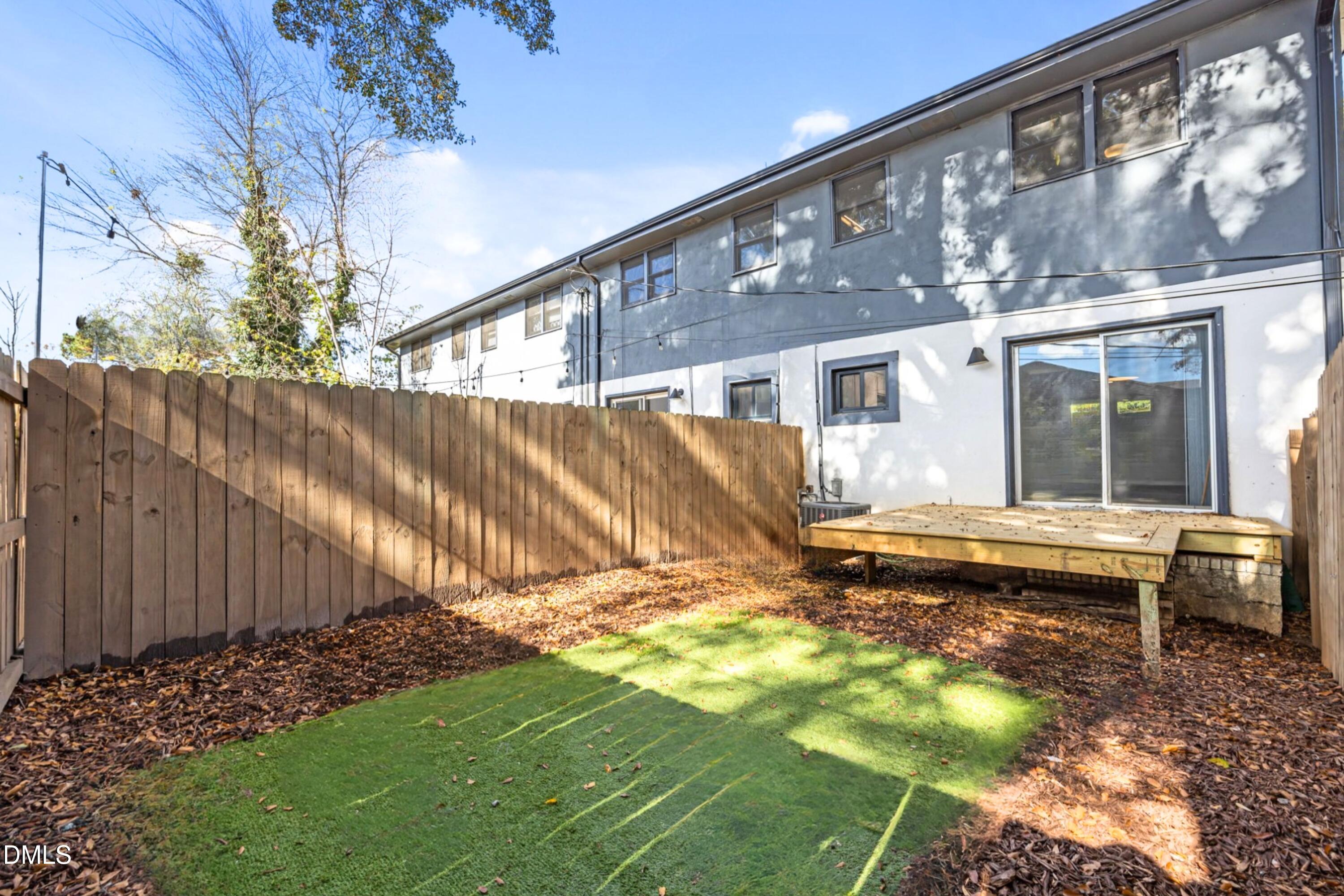 1618 Boyer Street Raleigh, NC 27610 - Photo 21 of 24 a view of a house with a yard