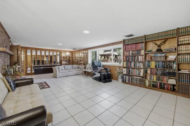 a bed room with a bed and a large window