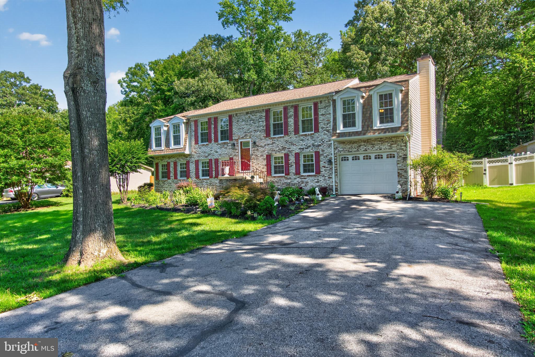 2816 Ridge Road Waldorf, MD 20603 - Photo 32 of 33 Charming stone-front home with lush greenery.