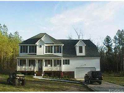 6600 Hair Road Disputanta, VA 23842 - Photo 1 of 1 a front view of a house with a yard