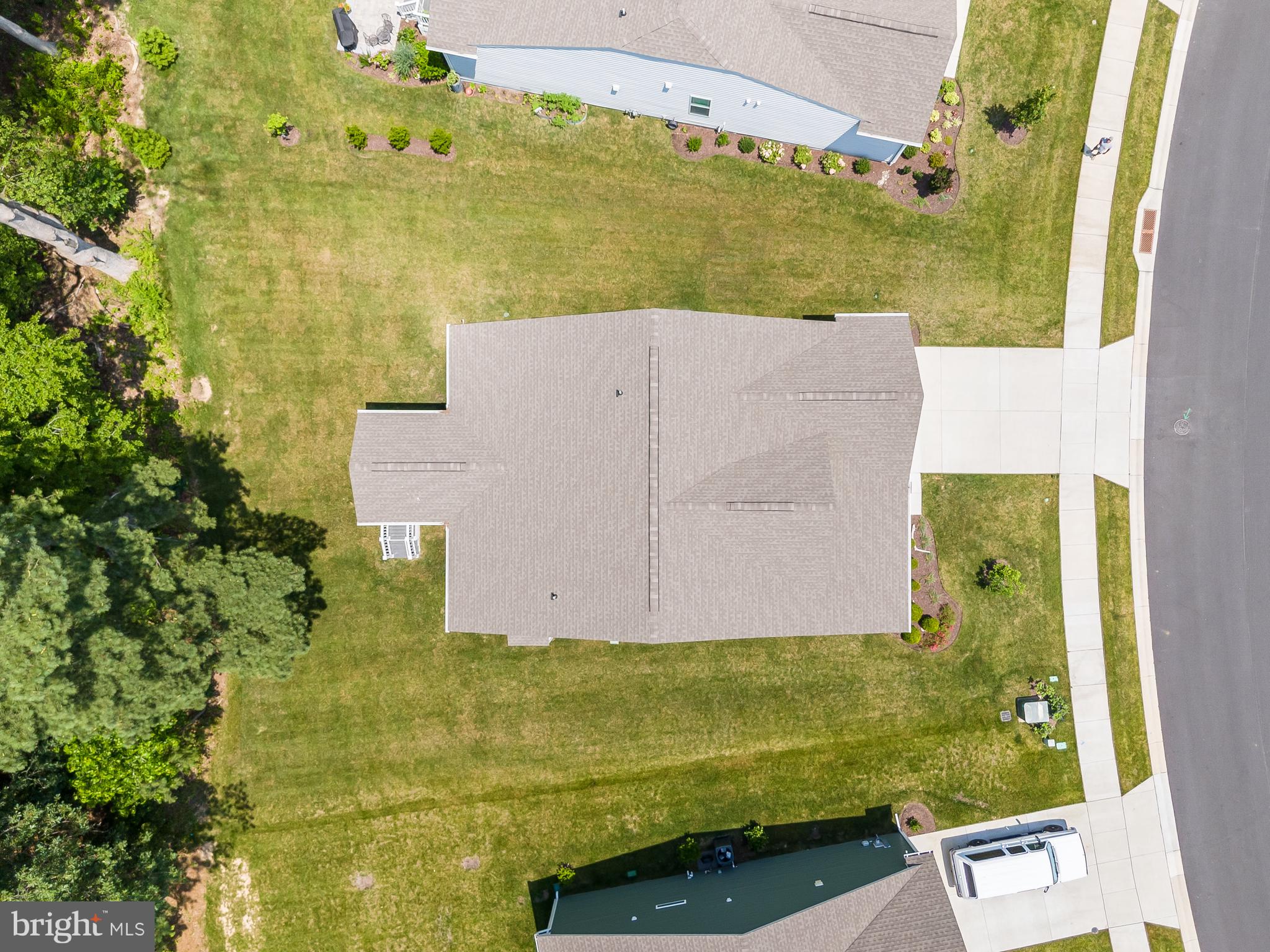 13091 Laurel Leaf Drive Lewes, DE 19958 - Photo 47 of 77 an aerial view of a house with a yard