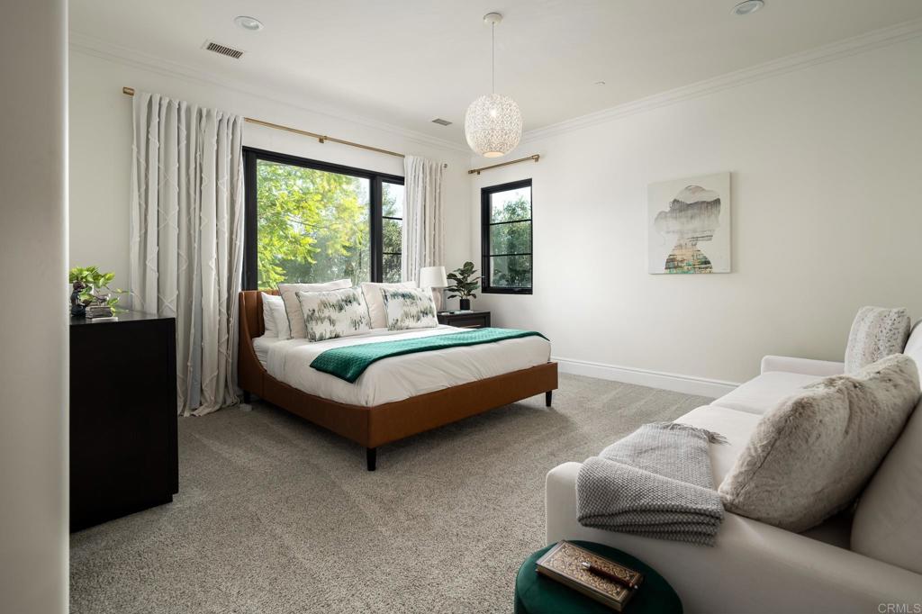 18000 Sunset Point Road Poway, CA 92064 - Photo 19 of 36 a bedroom with a bed couch and a large window
