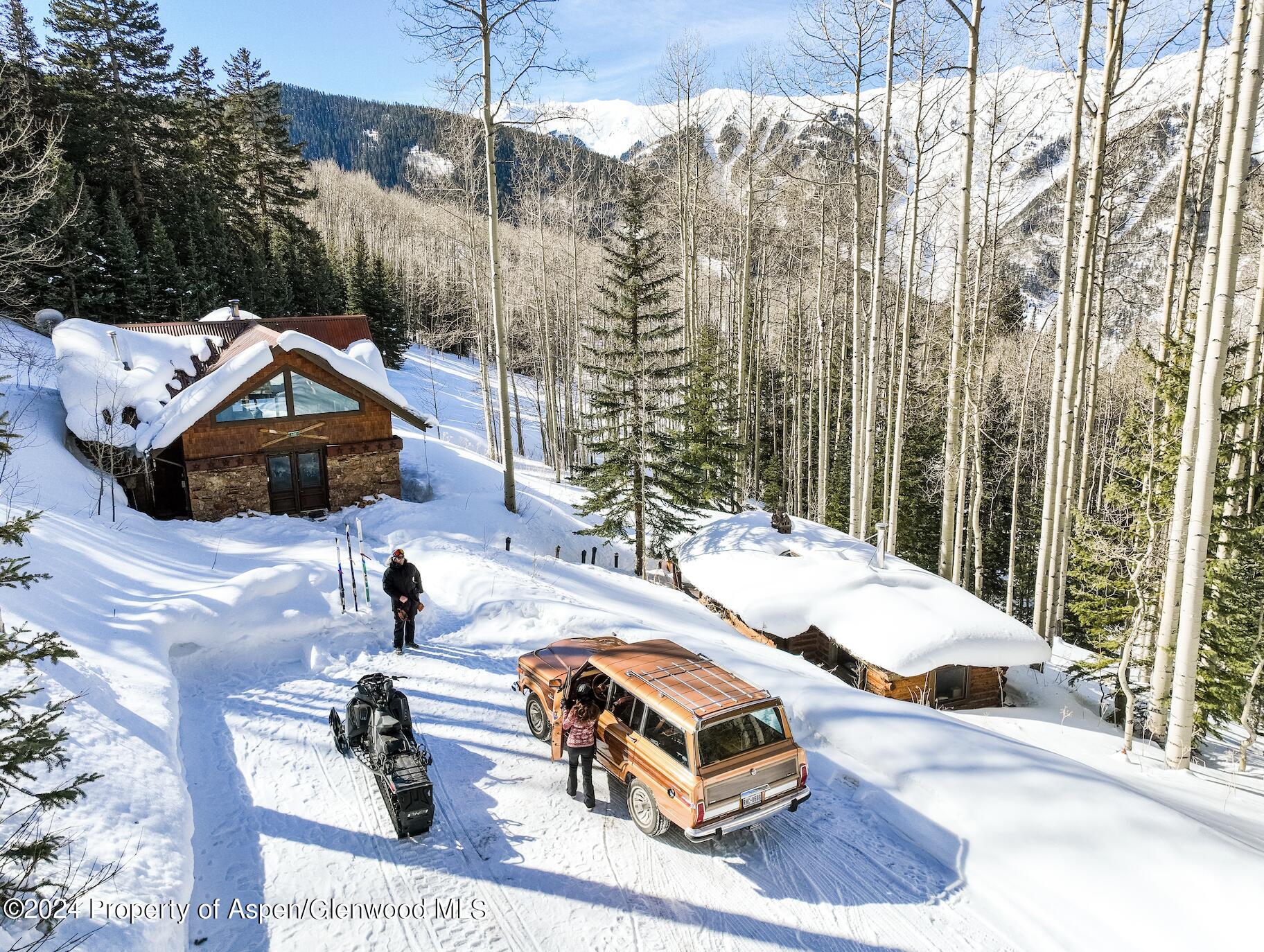 88 S Meadow Aspen, CO 81612 - Photo 13 of 40 a car parked on the side of the road