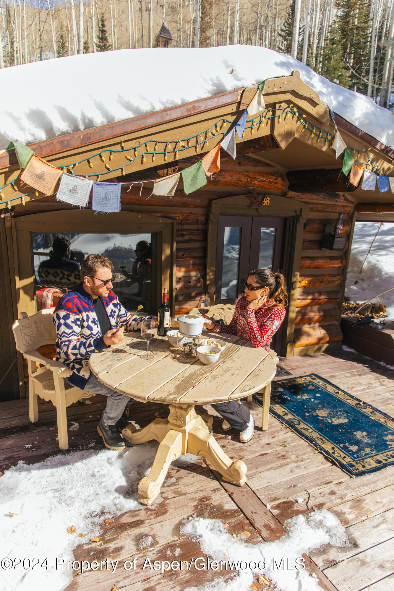 88 S Meadow Aspen, CO 81612 - Photo 16 of 40 a view of a cafe with a table and chairs in the patio