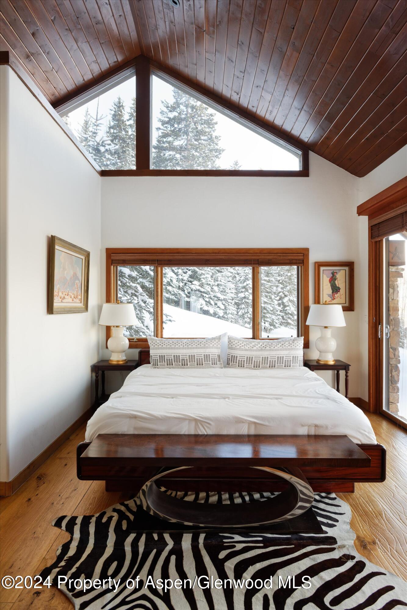 88 S Meadow Aspen, CO 81612 - Photo 8 of 40 a bed sitting in a bedroom next to a window