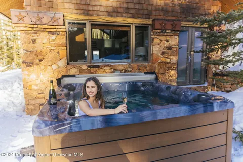 a view of a wooden door of the house