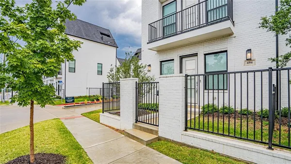 a view of a building with a porch