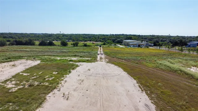 a view of a swimming pool with a bench