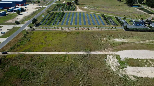 a view of a golf course with a lake