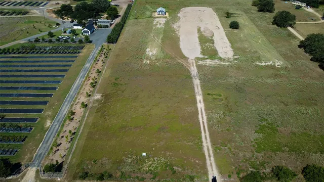 a view of a lake with a big yard