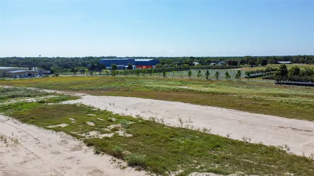 a view of a lake with a big yard