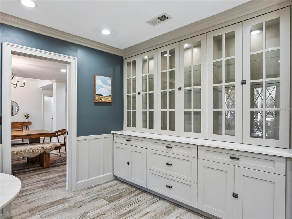 680 Southeast 123rd Street Road Ocala, FL 34480 - Photo 12 of 48 a living room with a large bed and furniture