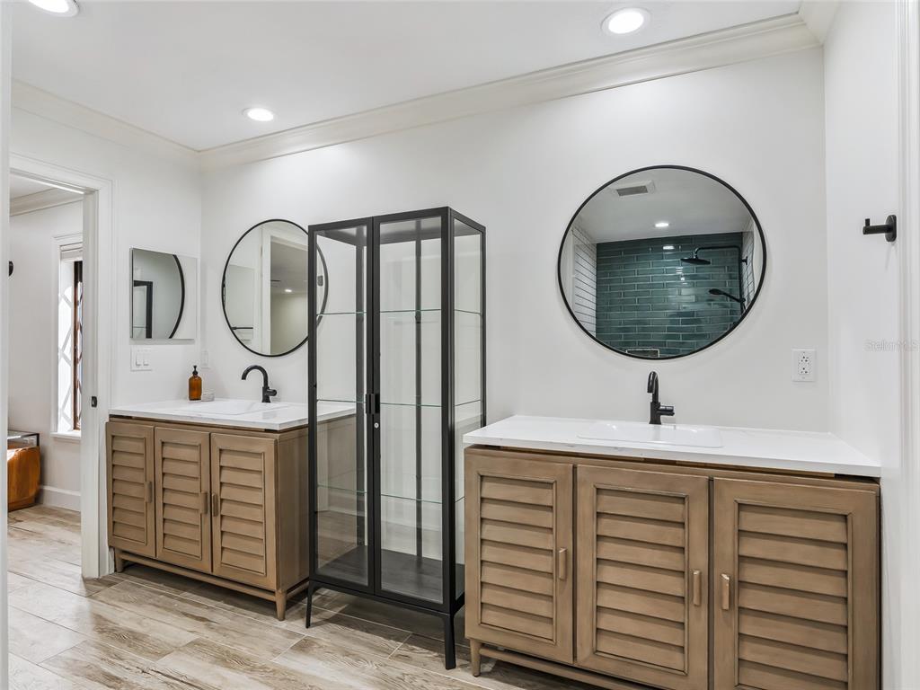 680 Southeast 123rd Street Road Ocala, FL 34480 - Photo 24 of 48 a view of a hallway with a washer and dryer