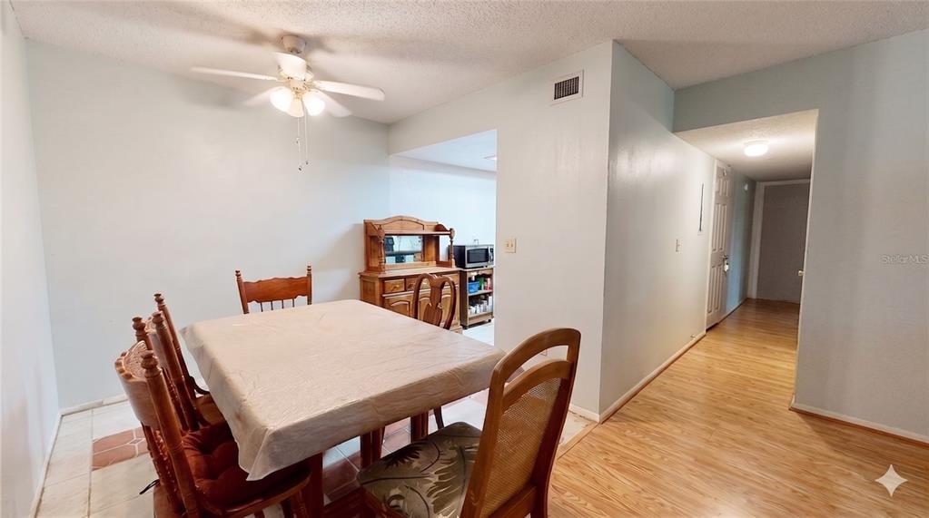 912 Lake Destiny Road, Unit F Altamonte Springs, FL 32714 - Photo 2 of 12 a view of a dining room with furniture