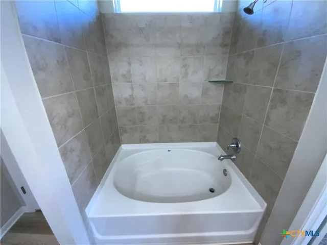 a storage room with washer and dryer