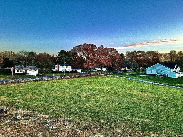 a view of a garden with houses