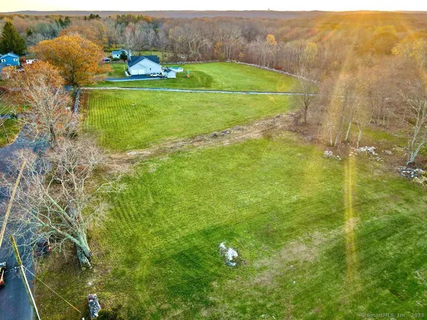 a view of a golf course with a building