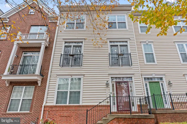 a view of a building with a yard