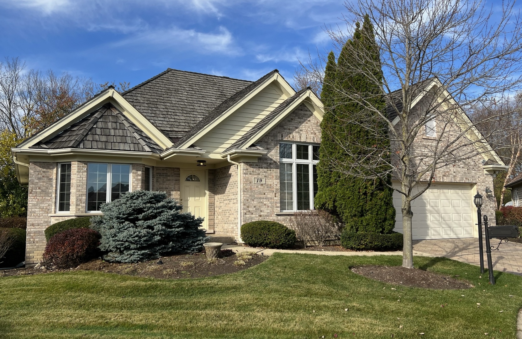 19 Lochbrook Lane Inverness, IL 60010 - Photo 1 of 27 a front view of a house with a yard