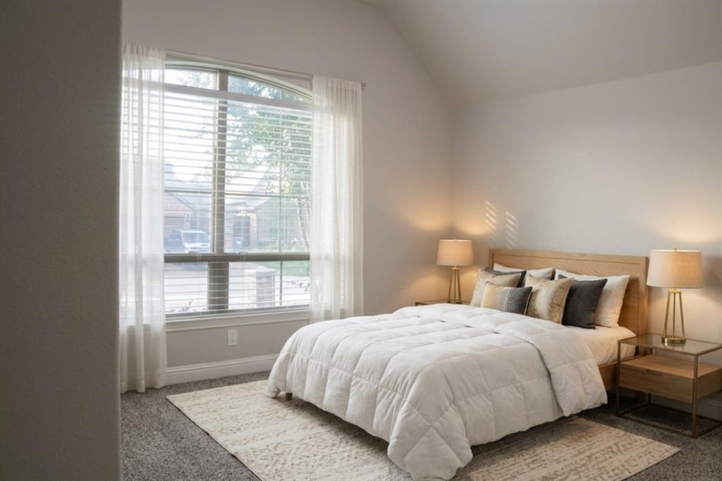 5709 Ridgepass Lane McKinney, TX 75071 - Photo 3 of 19 Virtual Staged Bedroom featuring a large arched window with blinds and, vaulted ceiling, and carpeted flooring
