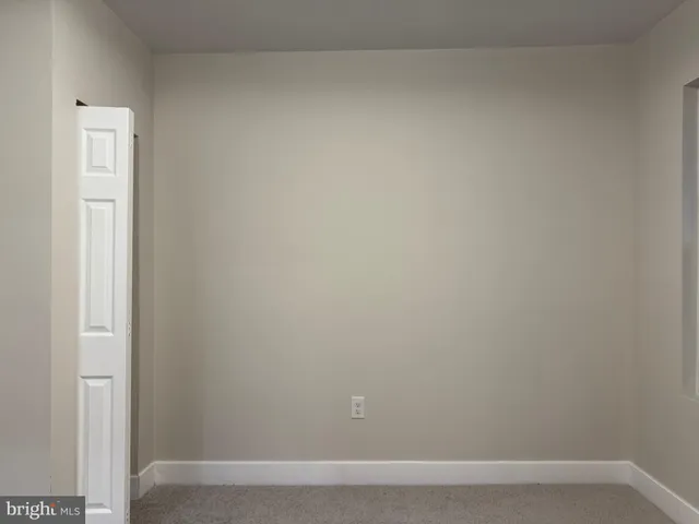 a bathroom with a toilet and a sink