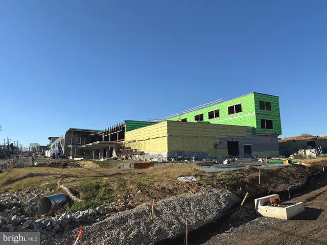 a utility room with washing machine
