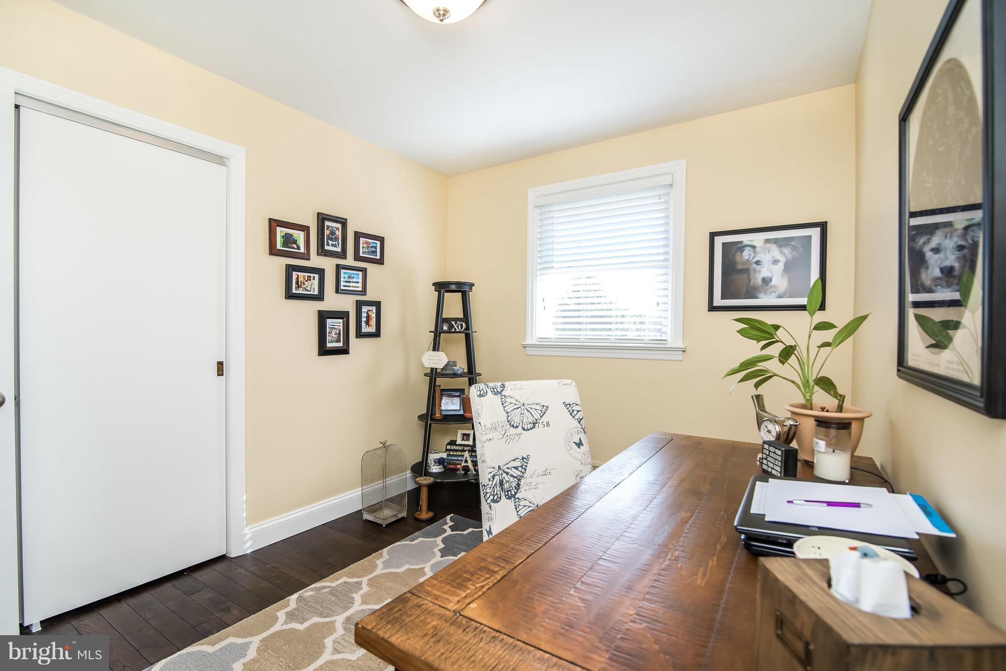 4042 High Point Road Ellicott City, MD 21042 - Photo 14 of 29 a room with furniture and wooden floor