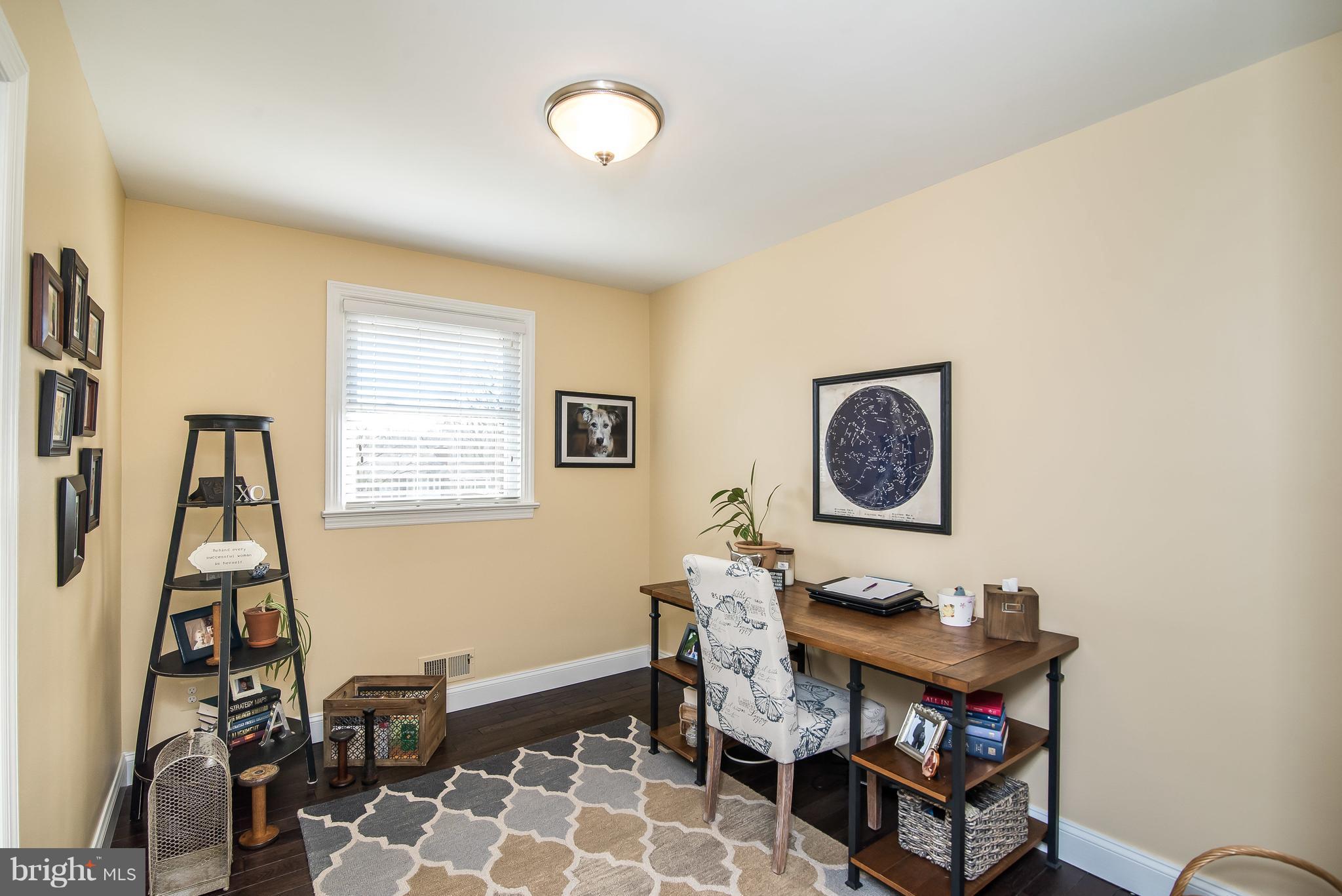 4042 High Point Road Ellicott City, MD 21042 - Photo 15 of 29 a view of a workspace with furniture and a window
