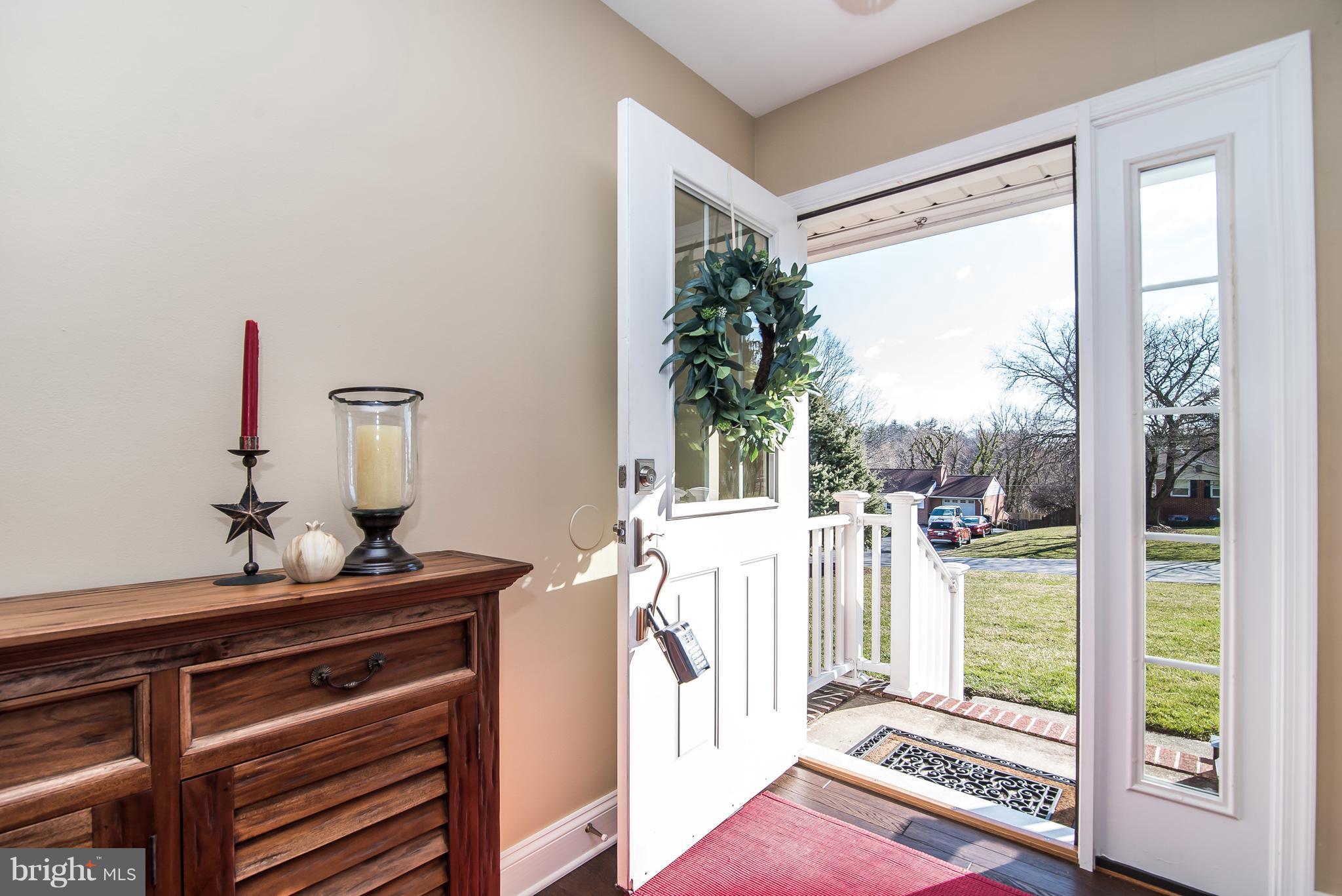 4042 High Point Road Ellicott City, MD 21042 - Photo 3 of 29 a very nice looking room with a large window and front door