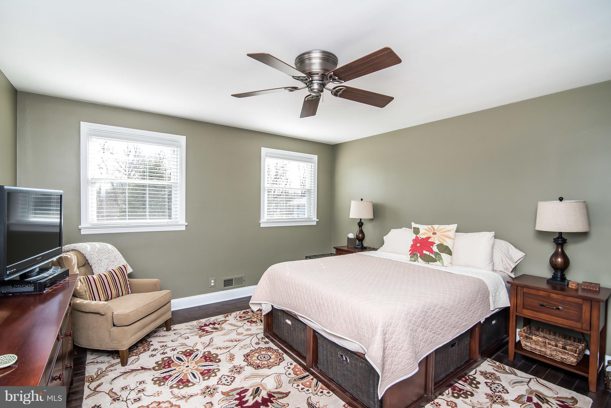 4042 High Point Road Ellicott City, MD 21042 - Photo 21 of 29 a bedroom with a bed and a couch