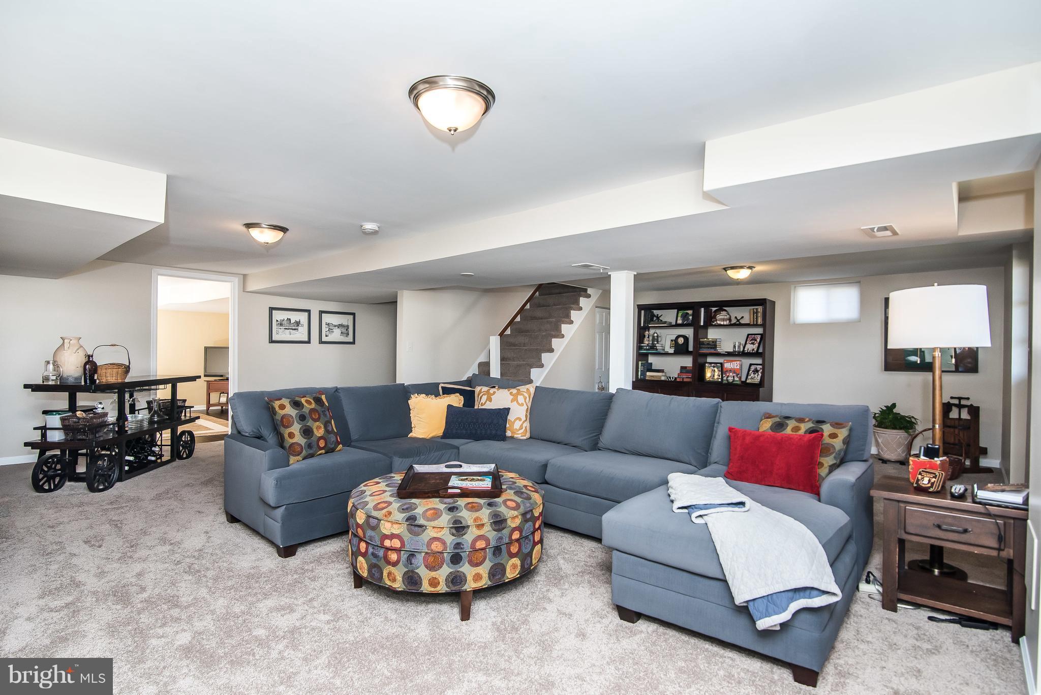 4042 High Point Road Ellicott City, MD 21042 - Photo 22 of 29 a living room with furniture kitchen view and a window