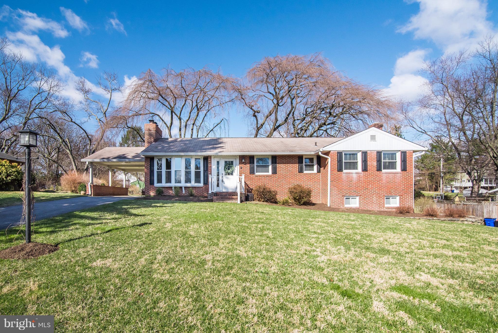 4042 High Point Road Ellicott City, MD 21042 - Photo 29 of 29 a front view of a house with a yard