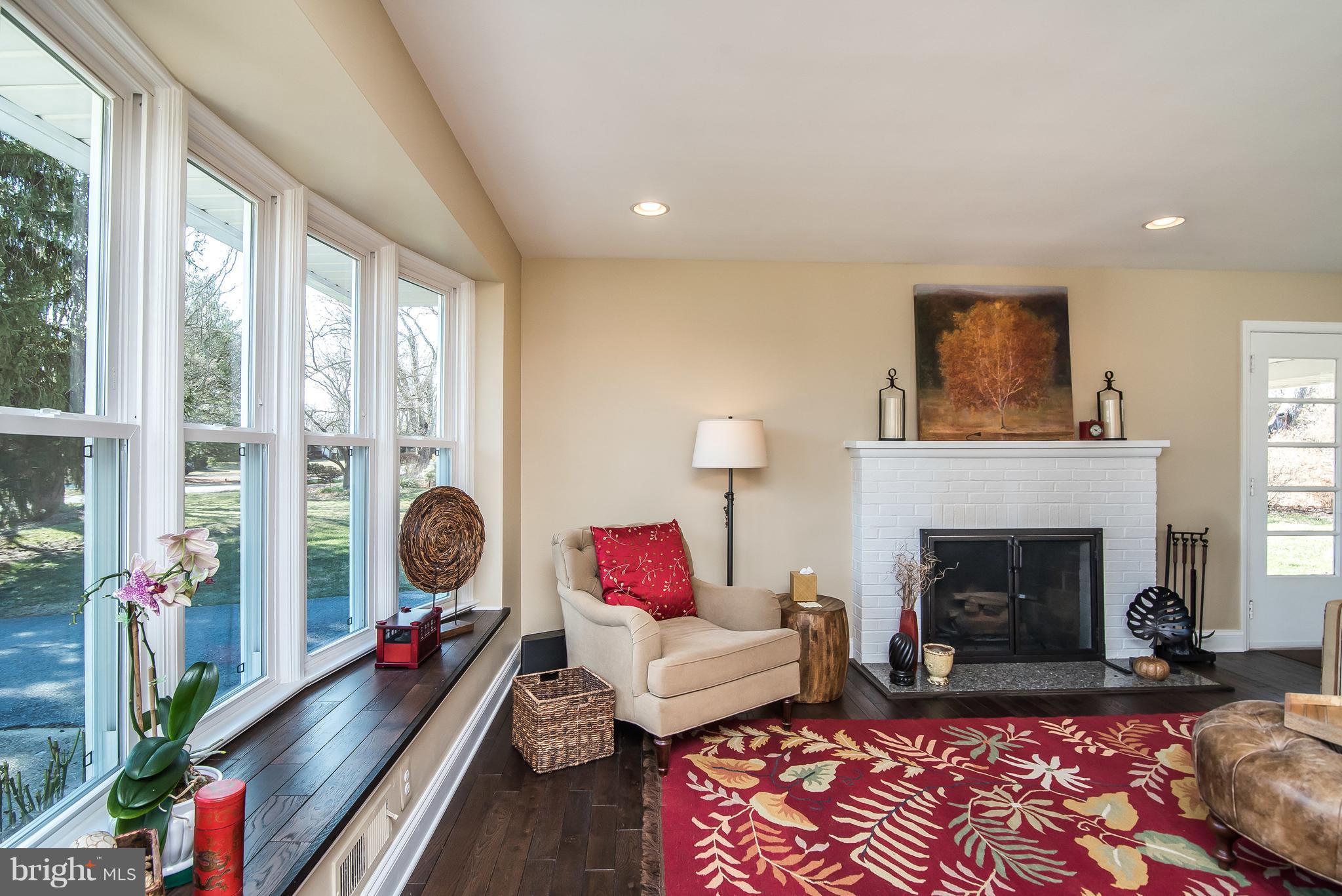 4042 High Point Road Ellicott City, MD 21042 - Photo 5 of 29 a living room with furniture fireplace and a large window