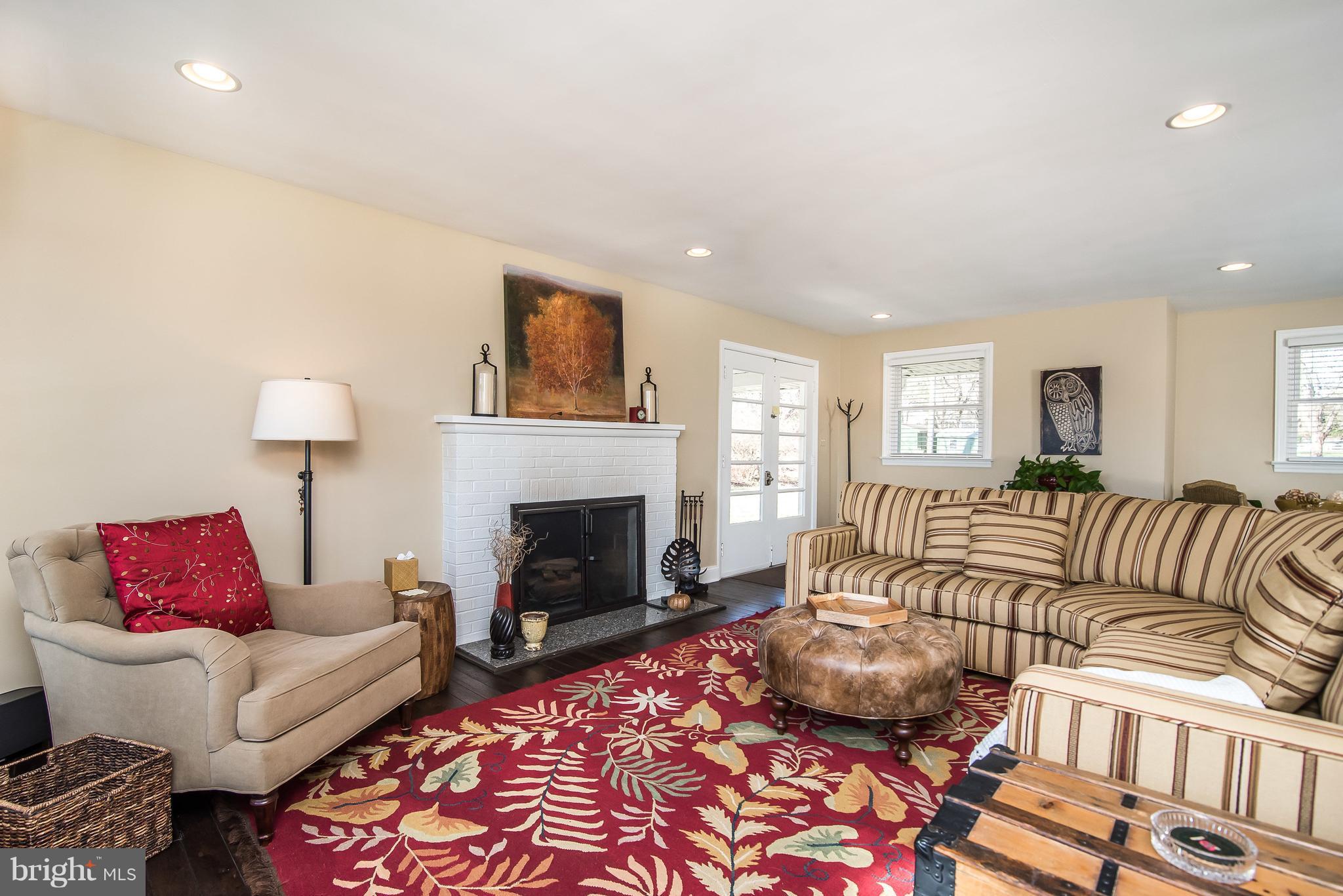 4042 High Point Road Ellicott City, MD 21042 - Photo 9 of 29 a living room with furniture fireplace and a window