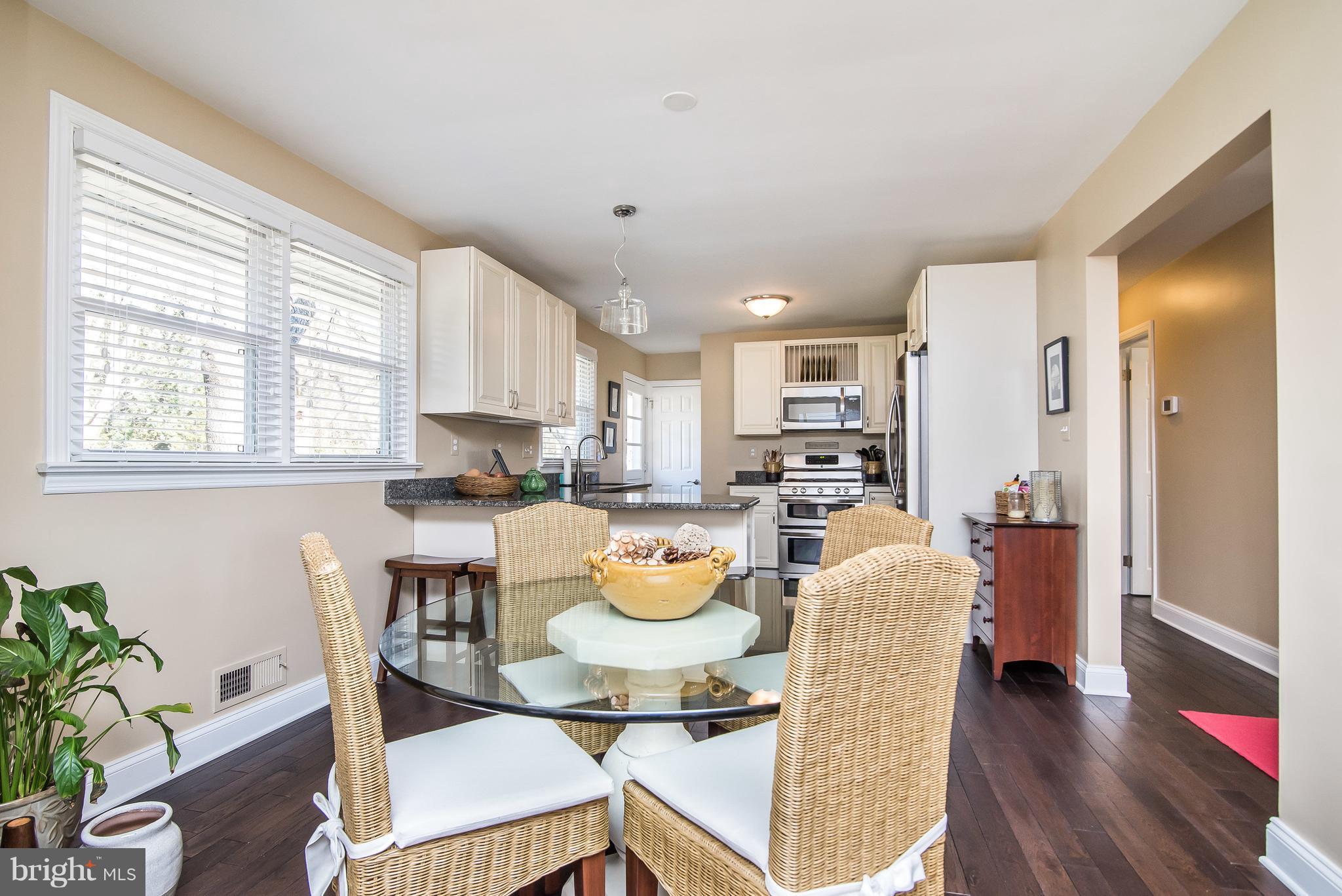 4042 High Point Road Ellicott City, MD 21042 - Photo 10 of 29 a dining room with furniture and wooden floor