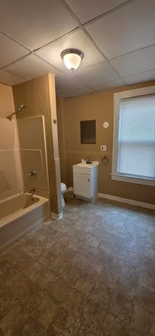 a view of a livingroom with a storage & utility room