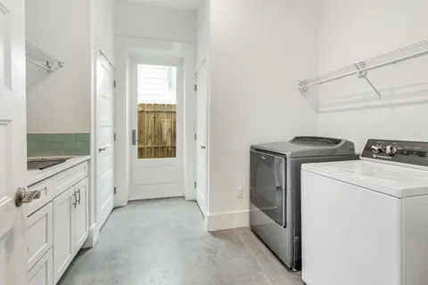 a view of utility room and washer and dryer