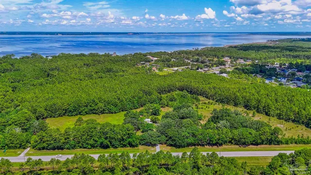 a view of a yard with an outdoor space