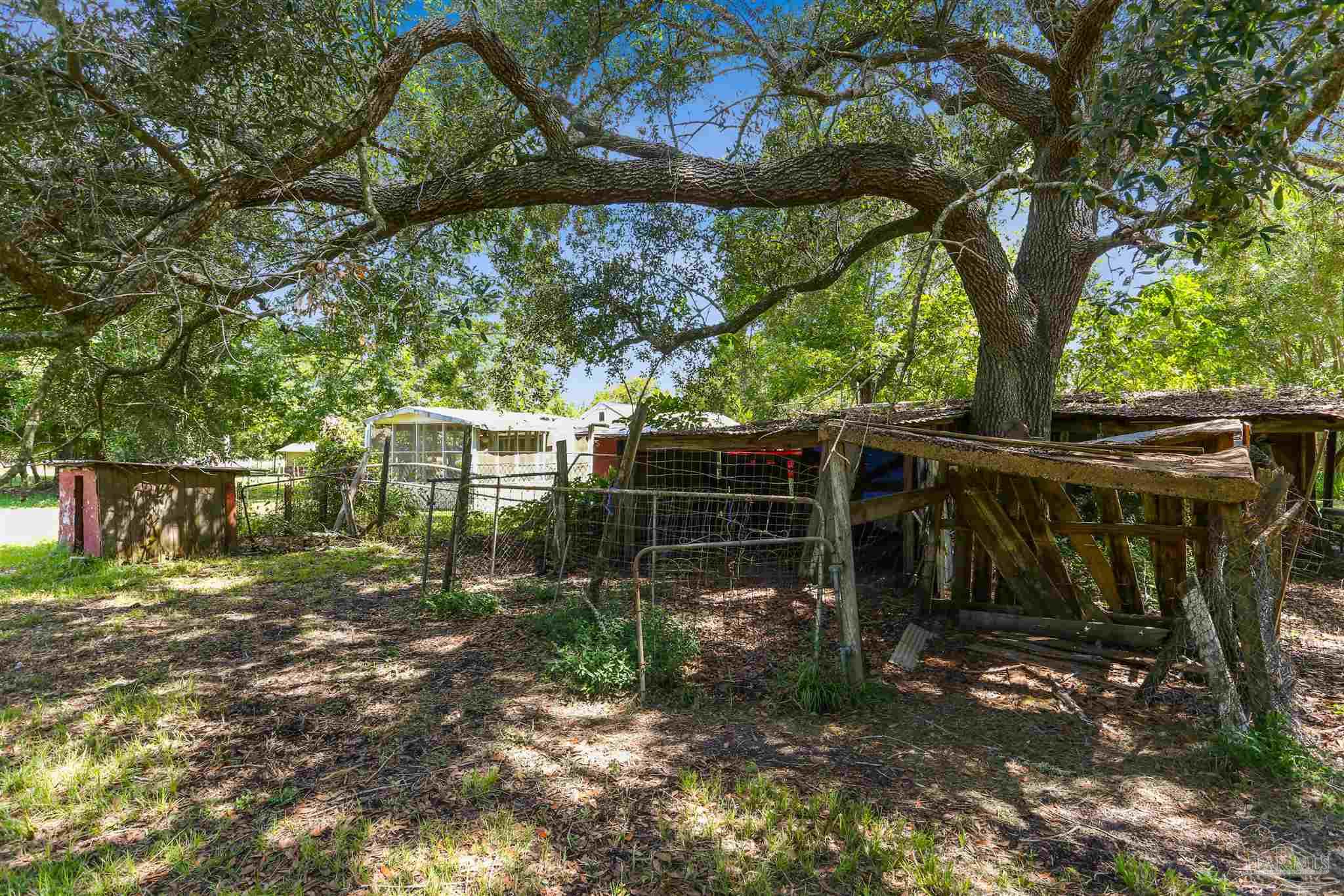 939 Avalon Boulevard Milton, FL 32583 - Photo 54 of 56 a view of outdoor space and yard