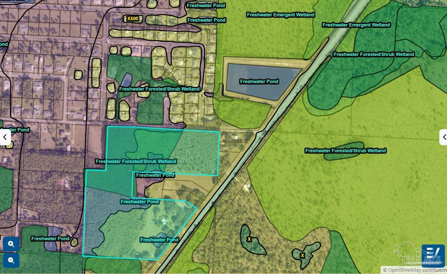 939 Avalon Boulevard Milton, FL 32583 - Photo 55 of 56 an aerial view of a swimming pool