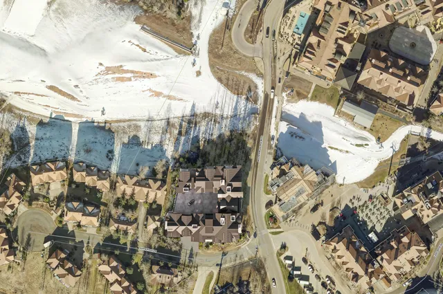 a view of a building with a swimming pool