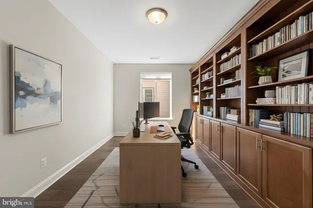 a view of a workspace with furniture
