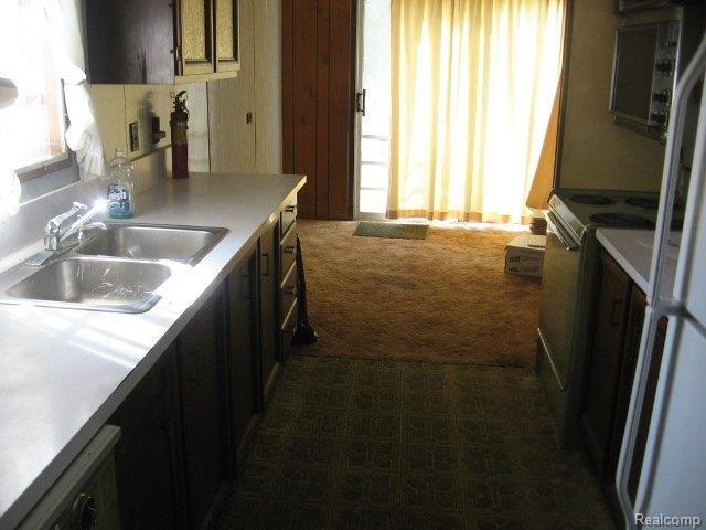 1370 South Van Dyke Road Decker, MI 48426 - Photo 3 of 12 1370_S._Van_Dyke_Kitchen_area