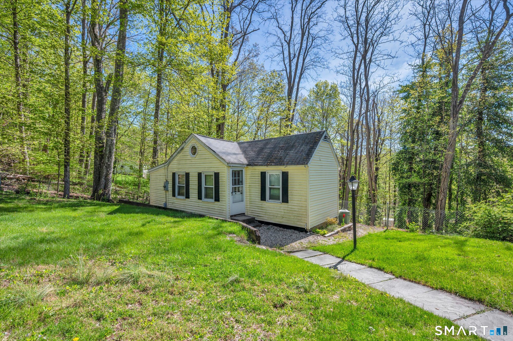 93 Torrington Avenue Canton, CT 06019 - Photo 1 of 24 a view of a house with backyard and garden