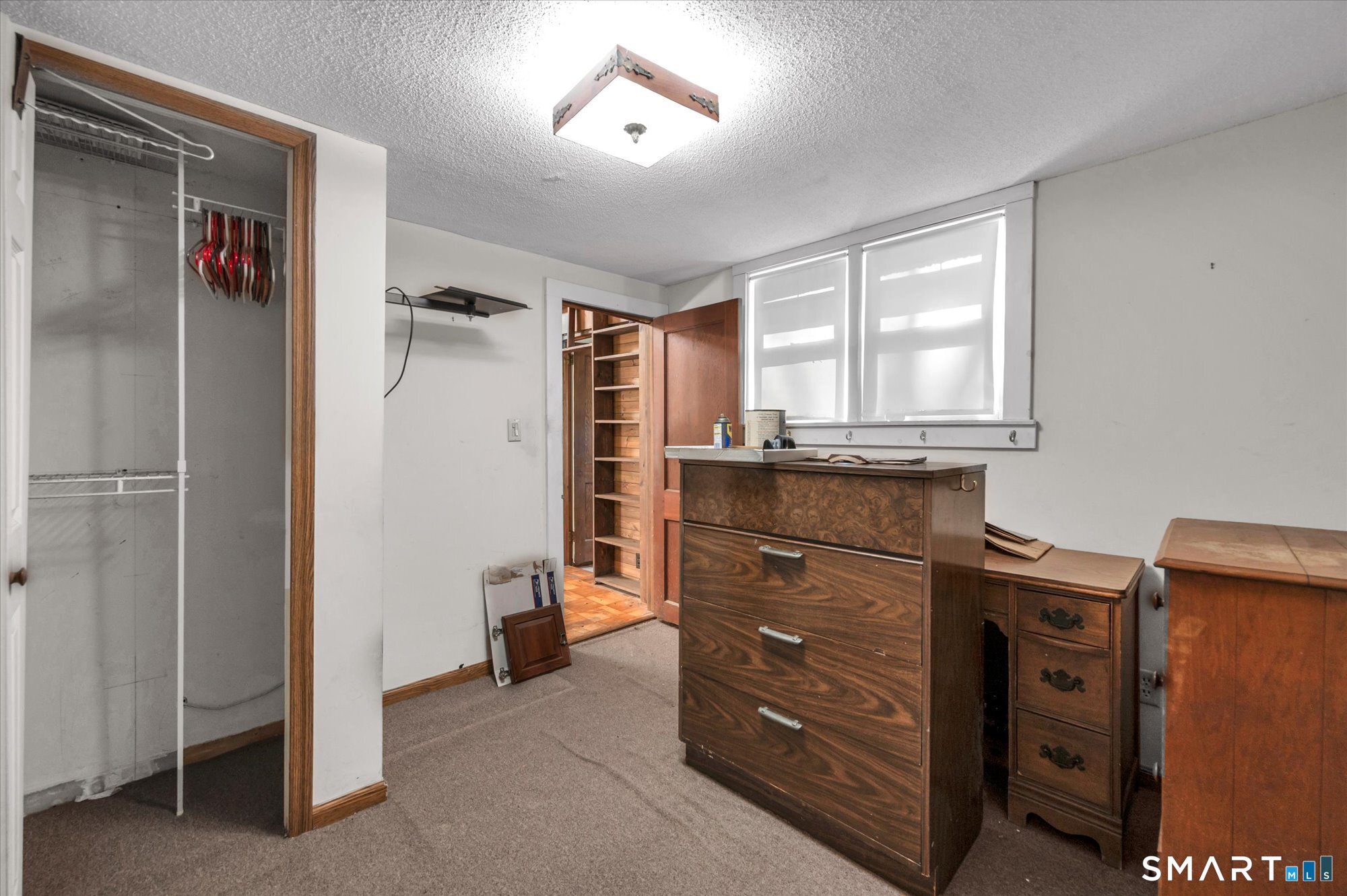 93 Torrington Avenue Canton, CT 06019 - Photo 11 of 24 a kitchen with a refrigerator and window