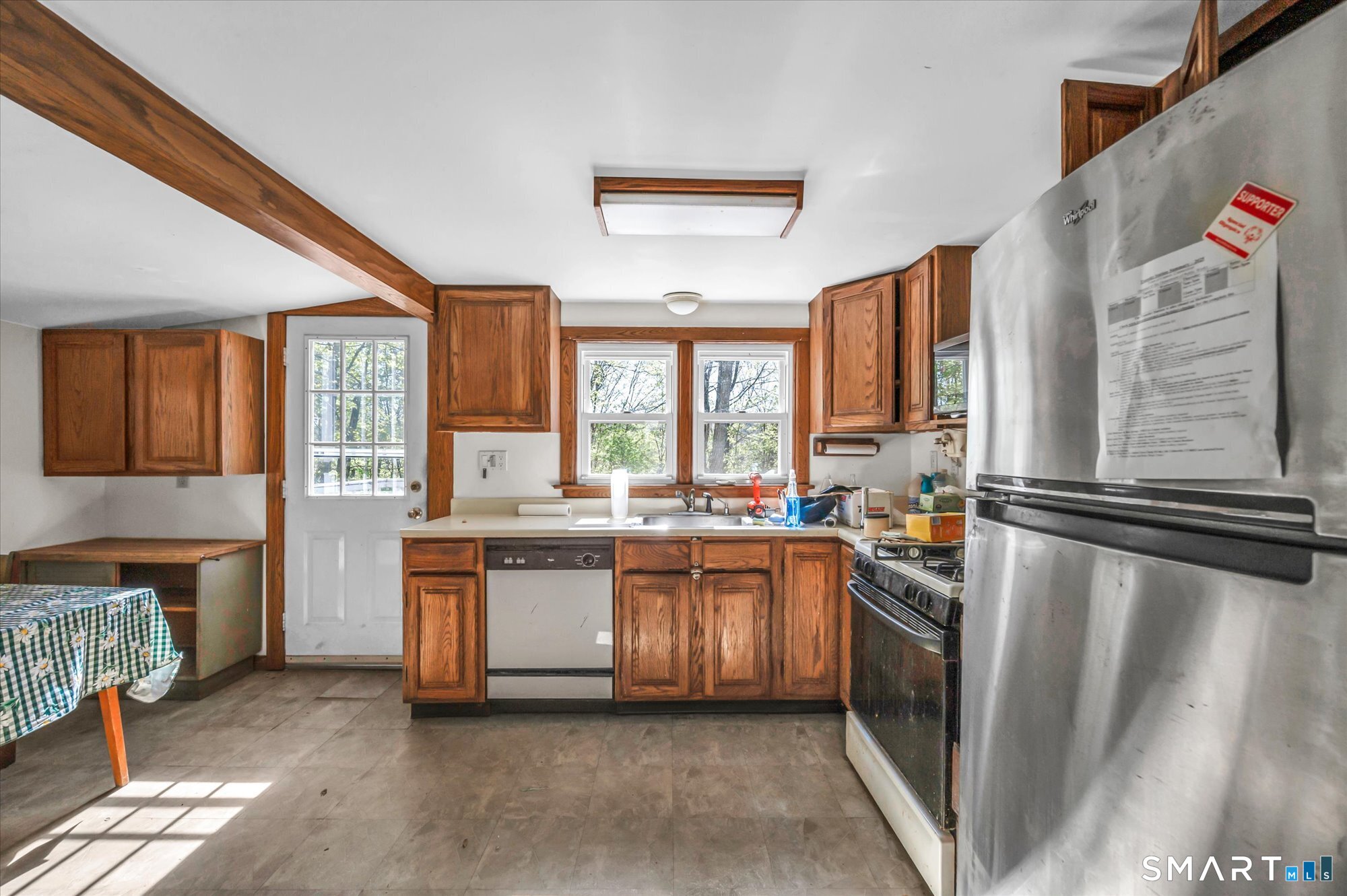 93 Torrington Avenue Canton, CT 06019 - Photo 13 of 24 a kitchen with stainless steel appliances granite countertop a stove a sink dishwasher and a refrigerator