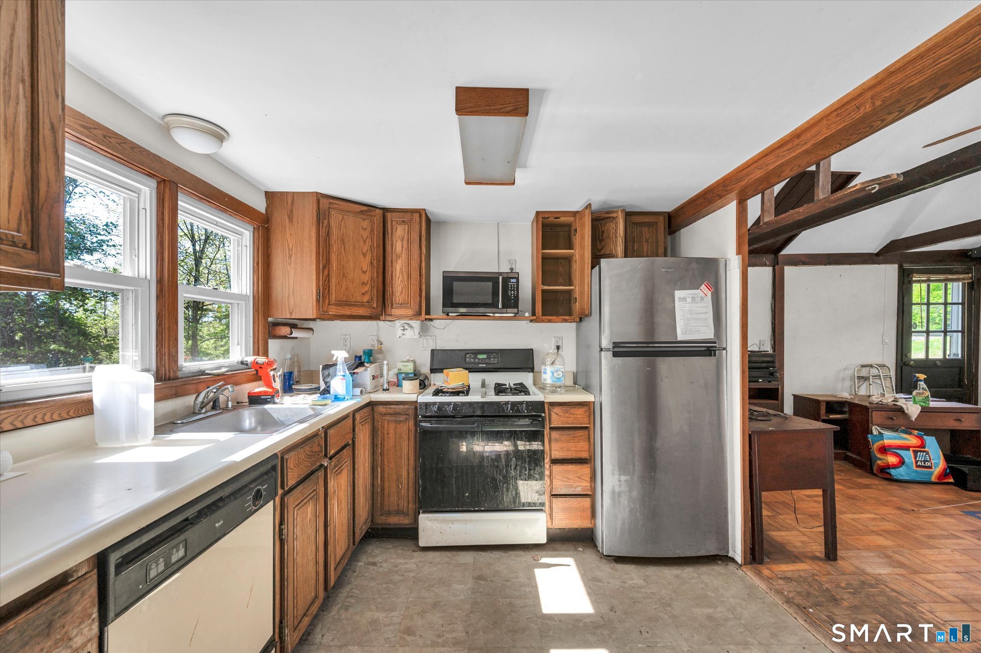 93 Torrington Avenue Canton, CT 06019 - Photo 14 of 24 a kitchen with stainless steel appliances a refrigerator sink and cabinets
