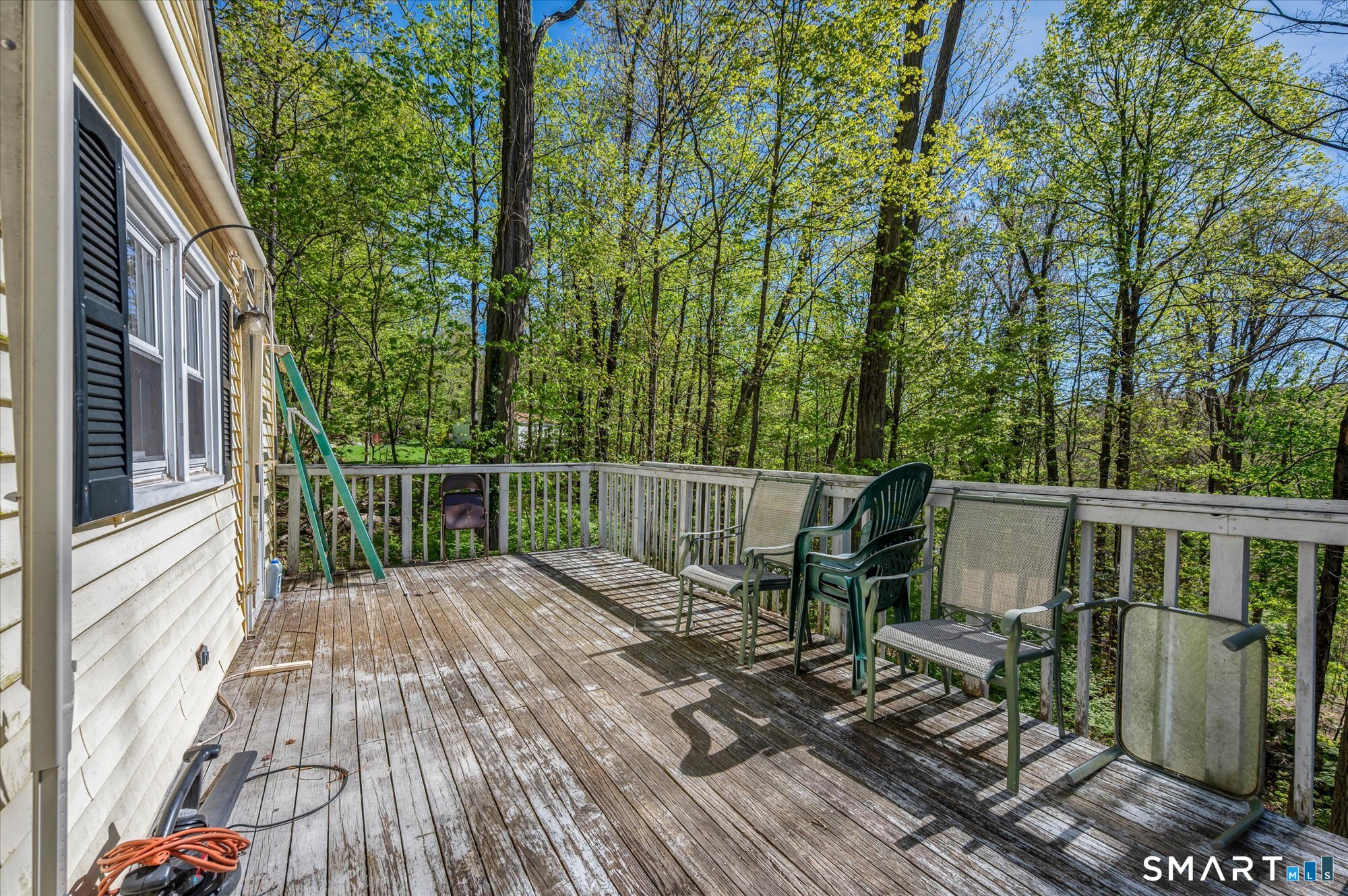 93 Torrington Avenue Canton, CT 06019 - Photo 19 of 24 a view of balcony with wooden floor and fence