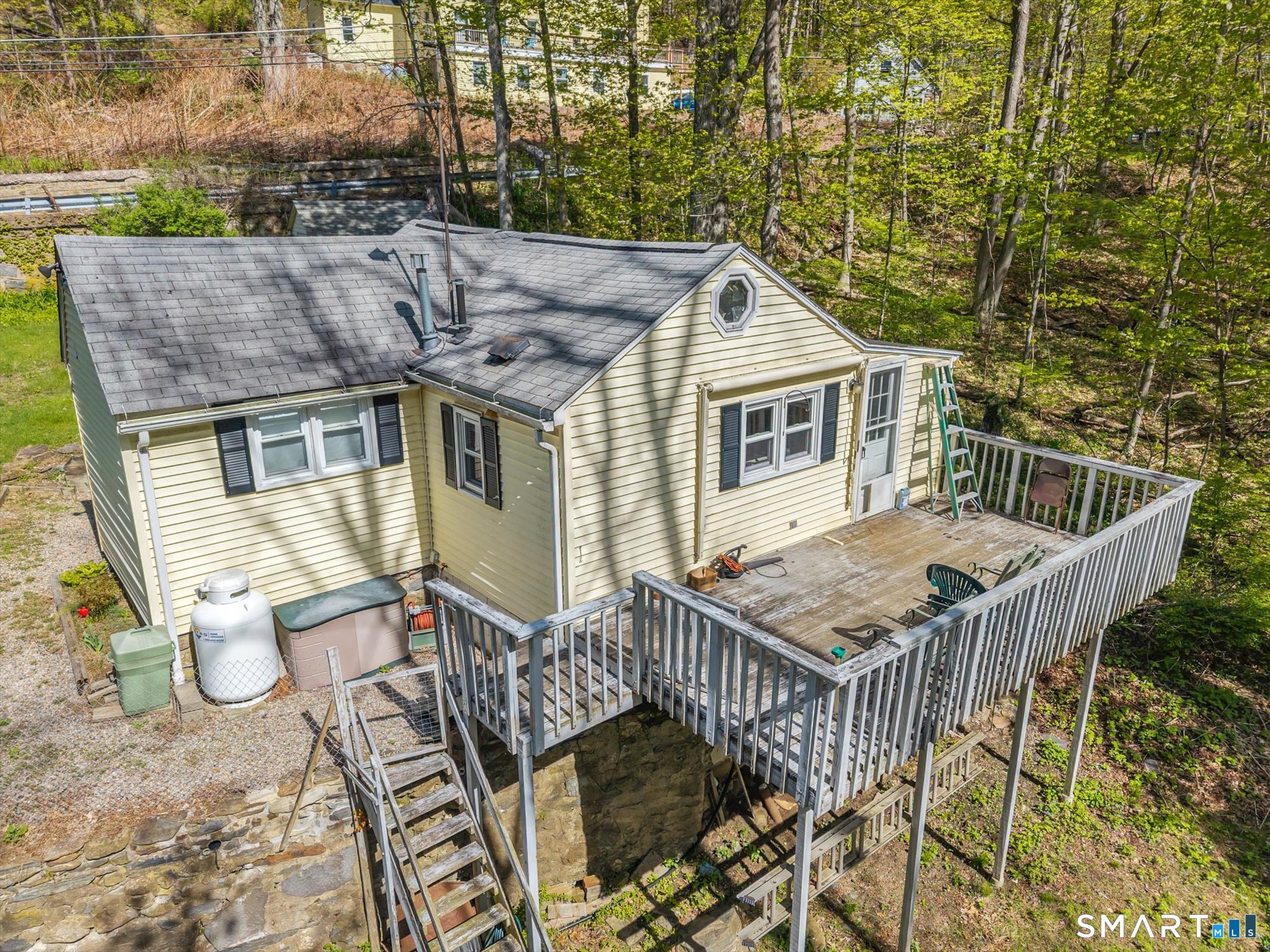 93 Torrington Avenue Canton, CT 06019 - Photo 21 of 24 a balcony with table and chairs
