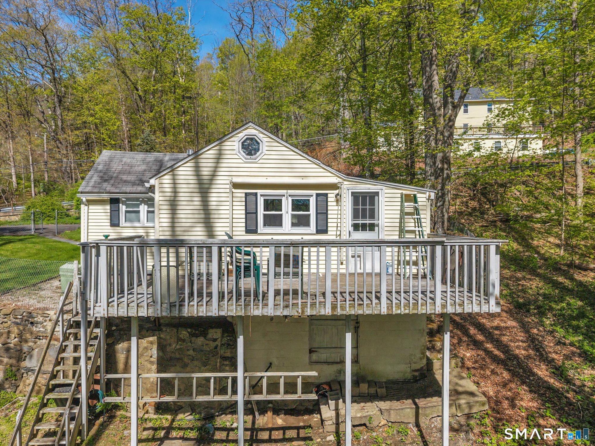 93 Torrington Avenue Canton, CT 06019 - Photo 22 of 24 a front view of a house with balcony
